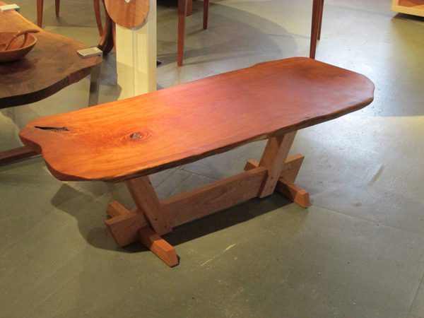 CHERRY LIVE EDGE COFFEE TABLE on CANTED TRESTLE BASE